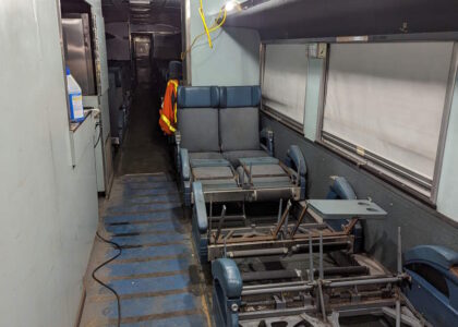 stripped down chairs inside a railway car