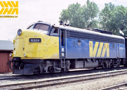 VIA Rail locomotive in yellow and blue livery